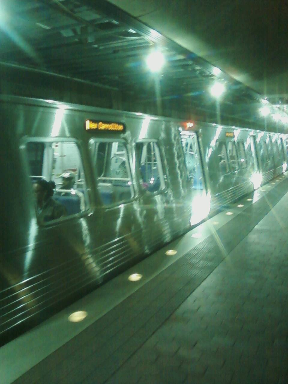 Shiny new 7000 series train servicing the Orange Line bound for New 
Carrollton, stops at L'Enfant Plaza's lower level platform. For further 
details, please visit www.wirelessnotes.org.