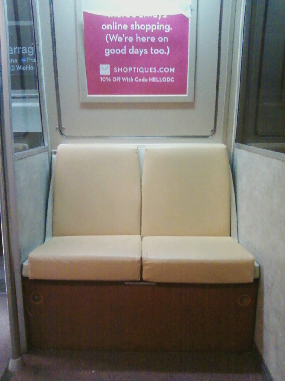 WMATA/DC Metro 2-seat set-aside section of car 1183; note that the 
two seat sections (one on each side of the car immediately adjacent to 
the motorman's cab) are protected from outdoor weather and elements, as 
well as the rest of the car body, but plastic dividers. For further 
details, please visit www.wirelessnotes.org.